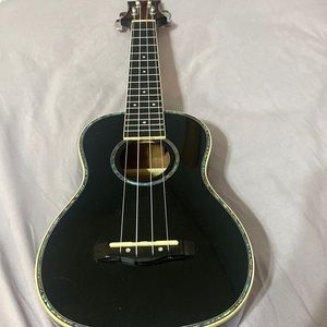 Black ukulele! Barely used!